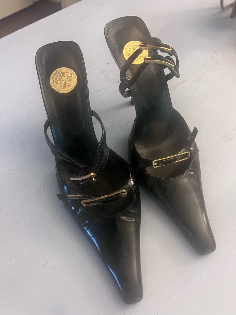 Versace Black Patent Pointed Slip-On Mules with Gold Medallion Accents